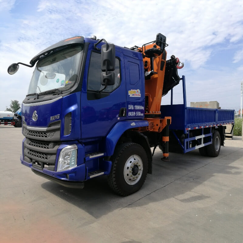 Outdoor view of a folded truck mounted crane ready for deployment